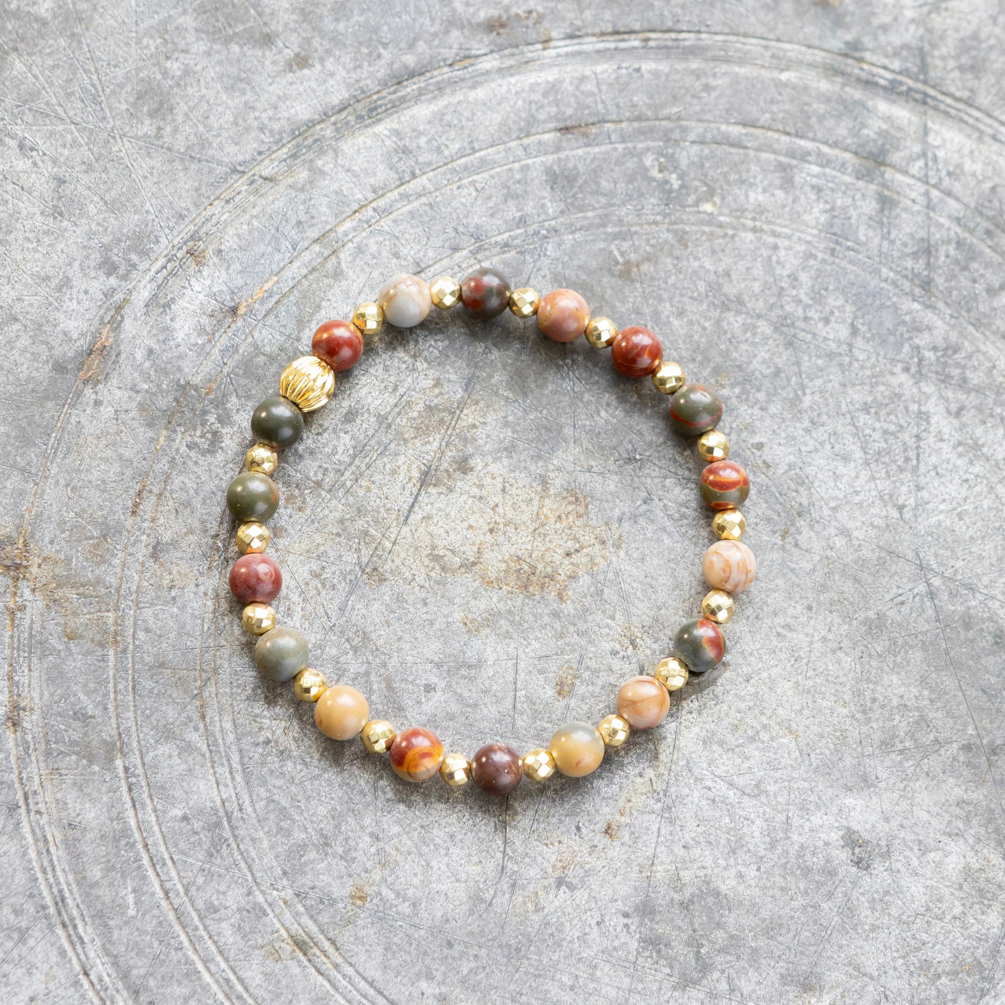 Picasso jaspis ja kullattu hematiitti rannekoru