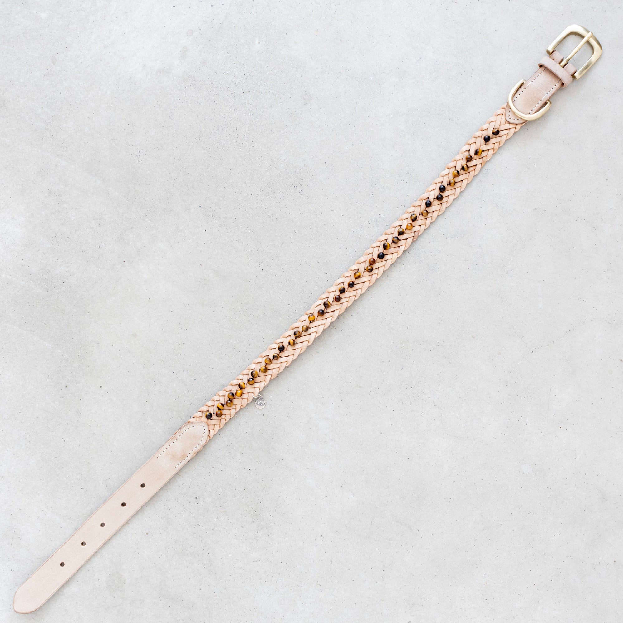 Nahkapanta tiikerinsilmä kivillä - Uli Design